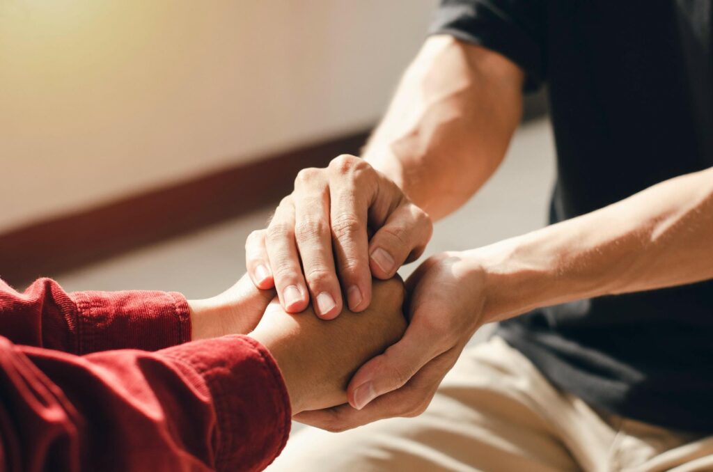 reassuring hand clasp